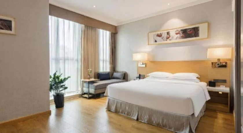 Bed in Ramada Encore by Wyndham Chongqing Yubei