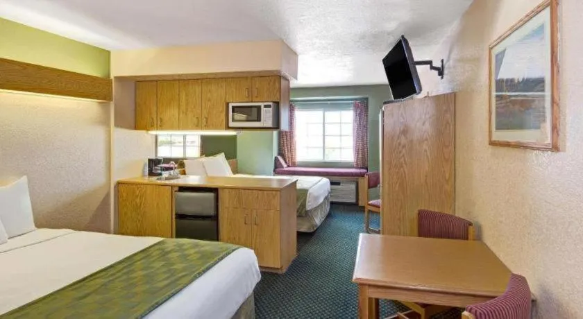 Bed in Microtel Inn & Suites by Wyndham Albuquerque West