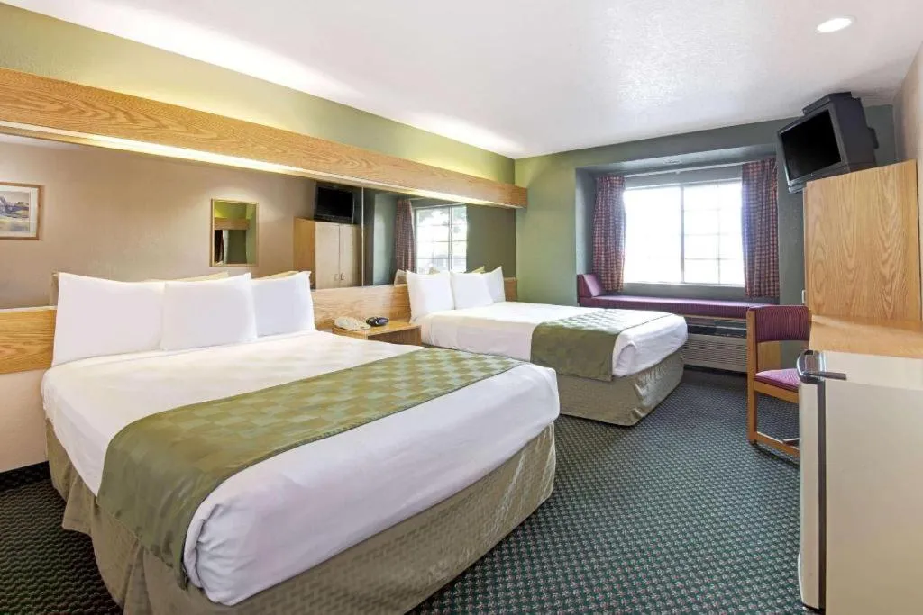 Bed in Microtel Inn & Suites by Wyndham Albuquerque West