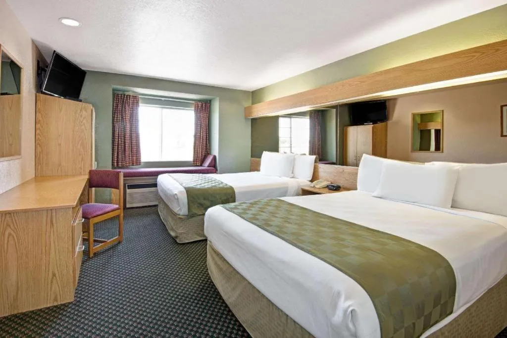 Bed in Microtel Inn & Suites by Wyndham Albuquerque West