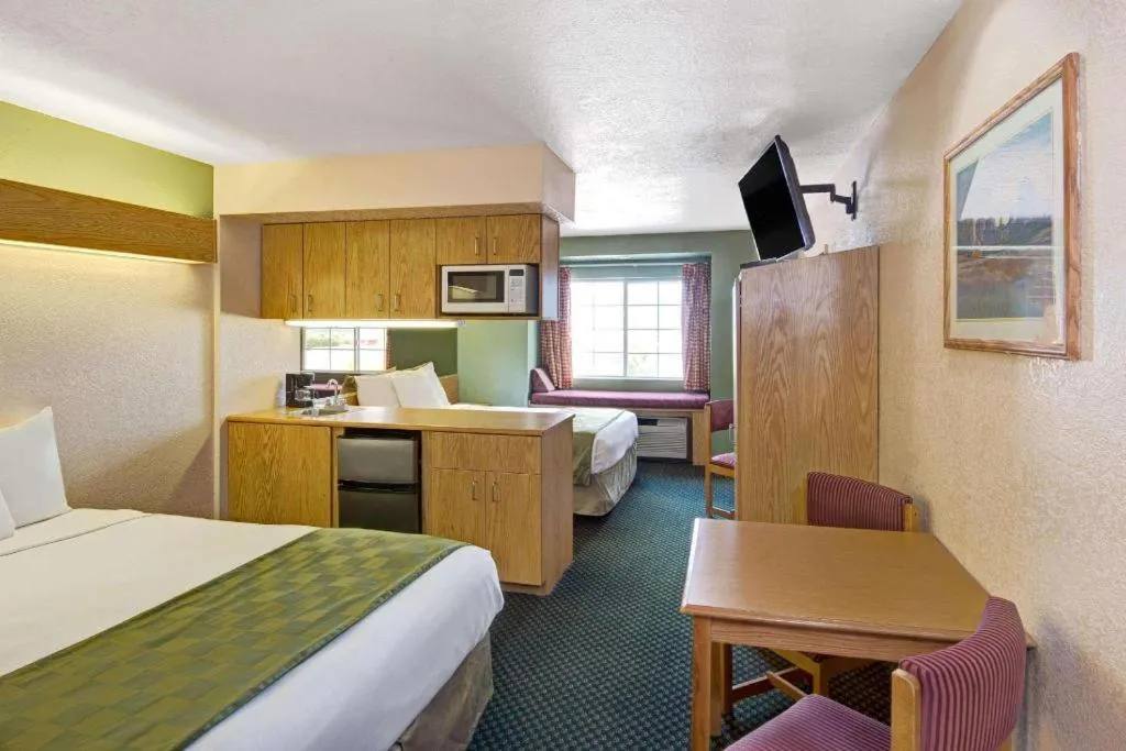 Bed in Microtel Inn & Suites by Wyndham Albuquerque West