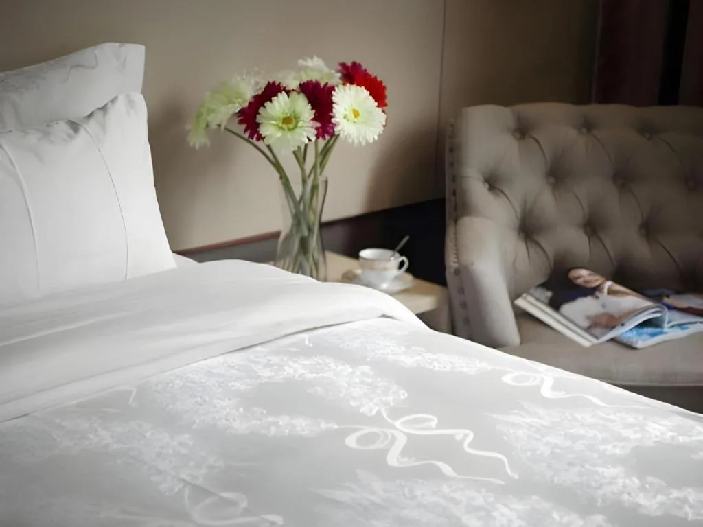 Bed in Hanyong Hotel Shenzhen International Exhibition Center