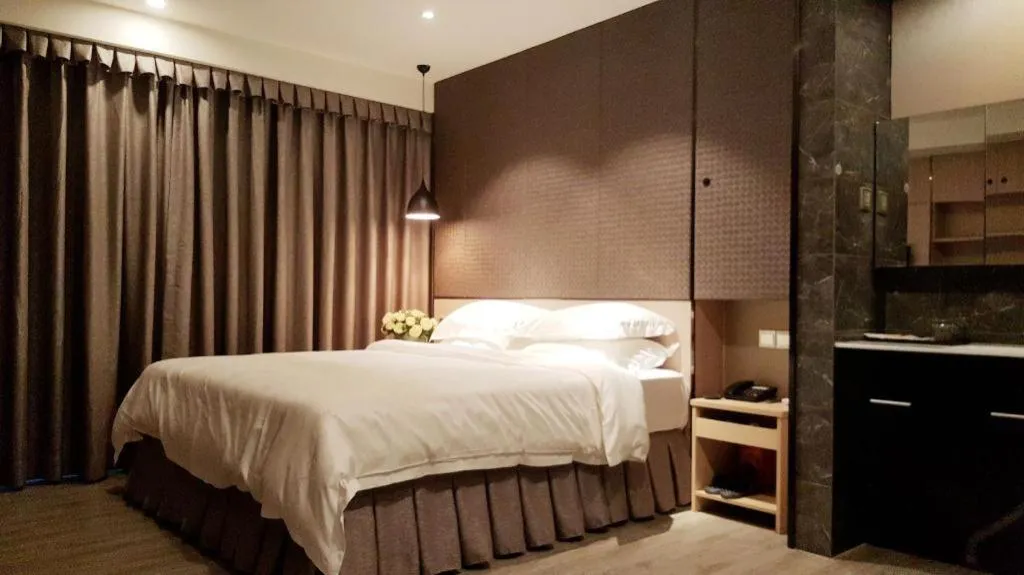 Bed in Hanyong Hotel Shenzhen International Exhibition Center
