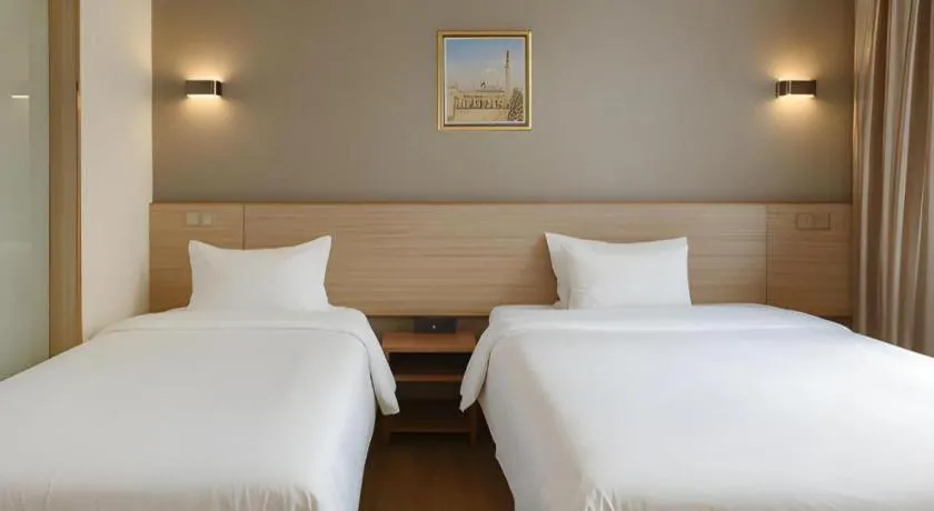 Bed in Hanyong Hotel Shenzhen International Exhibition Center