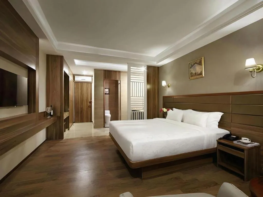 Bed in Hanyong Hotel Shenzhen International Exhibition Center