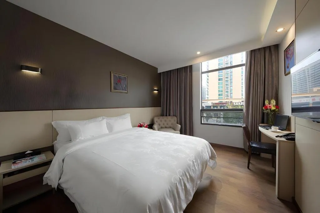 Bed in Hanyong Hotel Shenzhen International Exhibition Center