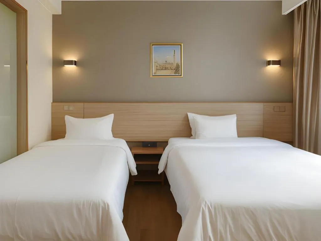 Bed in Hanyong Hotel Shenzhen International Exhibition Center