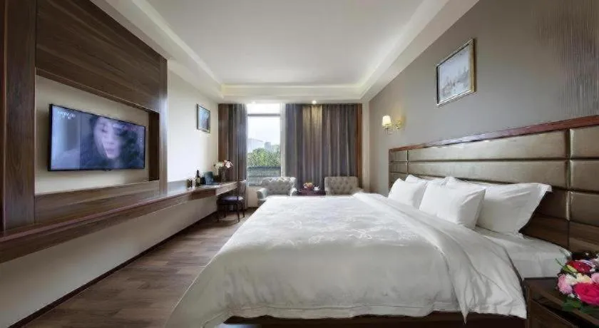 Bed in Hanyong Hotel Shenzhen International Exhibition Center