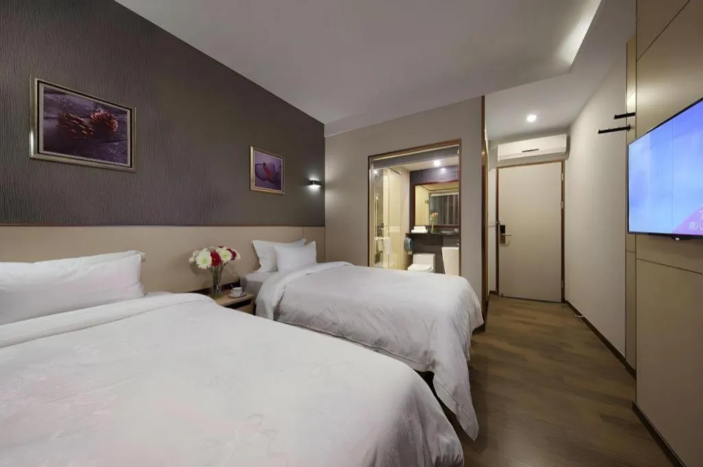 Bed in Hanyong Hotel Shenzhen International Exhibition Center