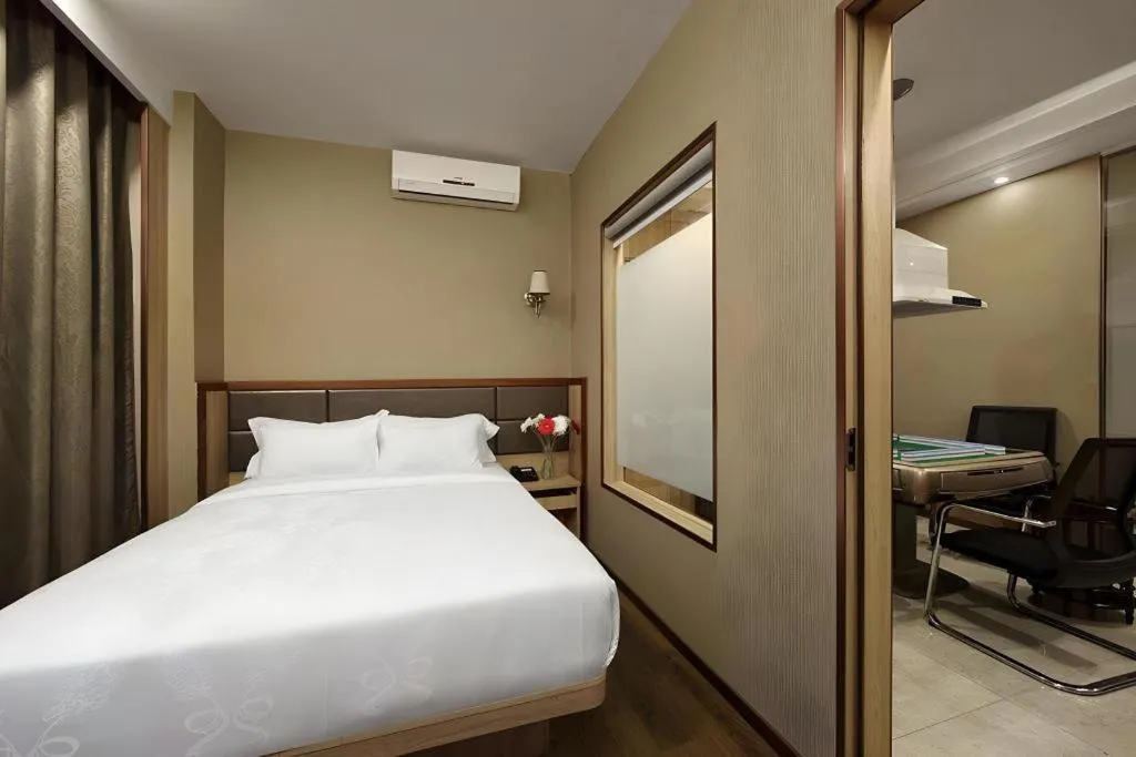 Bed in Hanyong Hotel Shenzhen International Exhibition Center