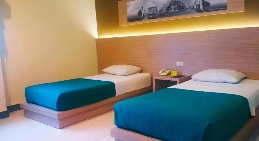 Bed in Muria Hotel