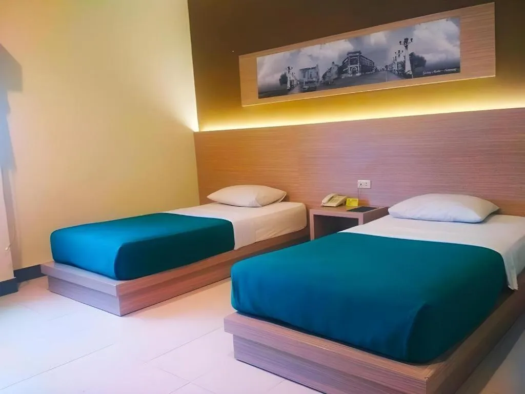 Bed in Muria Hotel