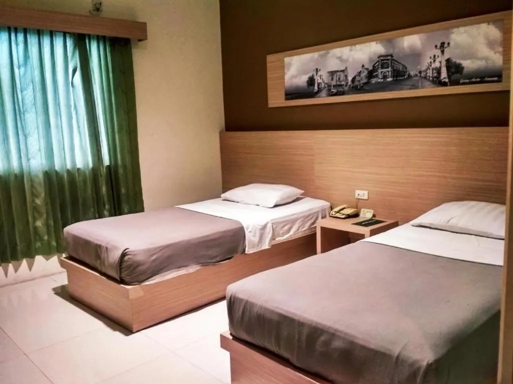 Bed in Muria Hotel