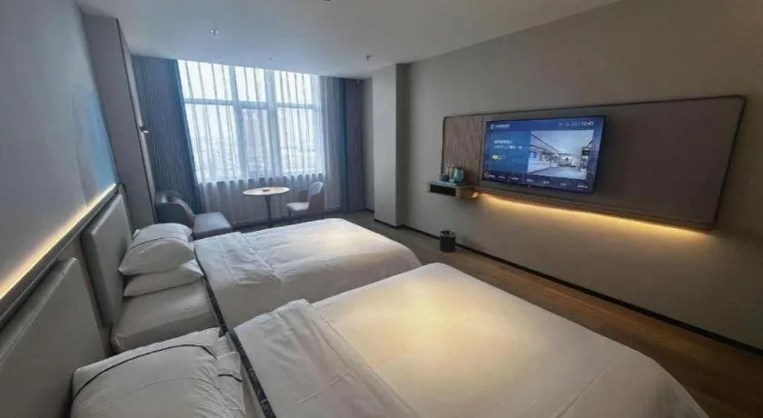 Bed in City Comfort Inn Hengyang Dayang Department Lianhu Plaza