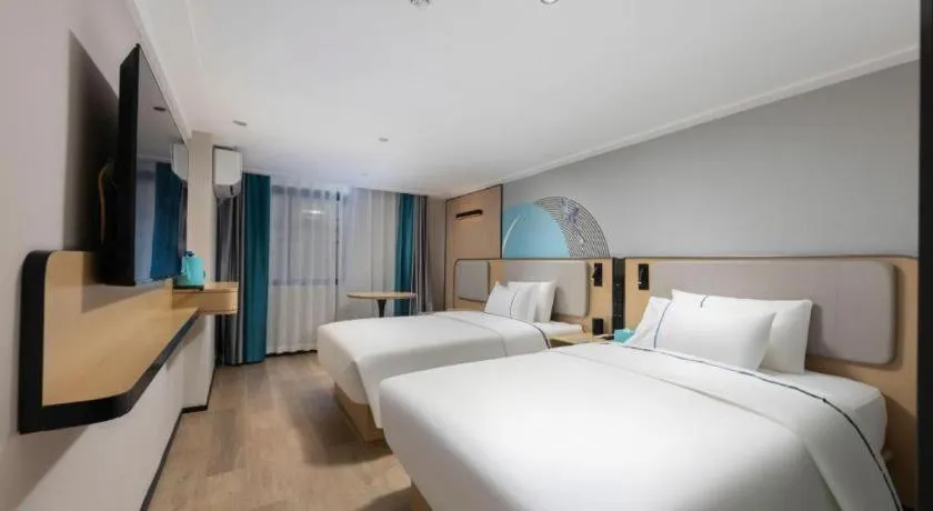 Bed in City Comfort Inn Hengyang Dayang Department Lianhu Plaza