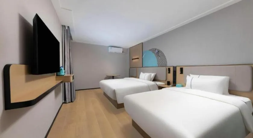 Bed in City Comfort Inn Hengyang Dayang Department Lianhu Plaza