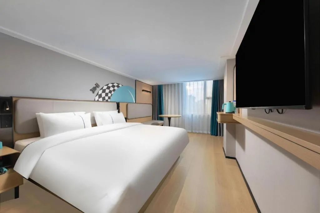 Bed in City Comfort Inn Hengyang Dayang Department Lianhu Plaza