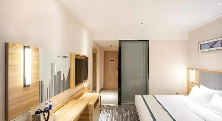 Bed in City Comfort Inn Hengyang Dayang Department Lianhu Plaza