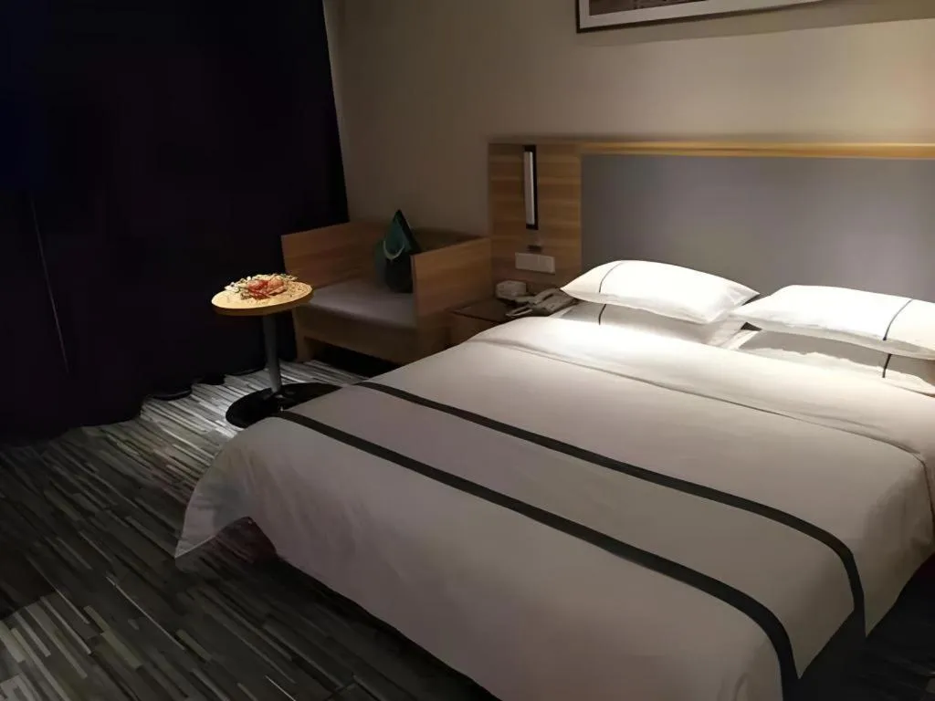 Bed in City Comfort Inn Hengyang Dayang Department Lianhu Plaza
