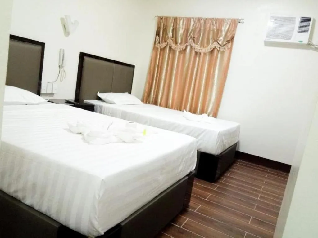 Bed in Meaco Royal Hotel- ILagan