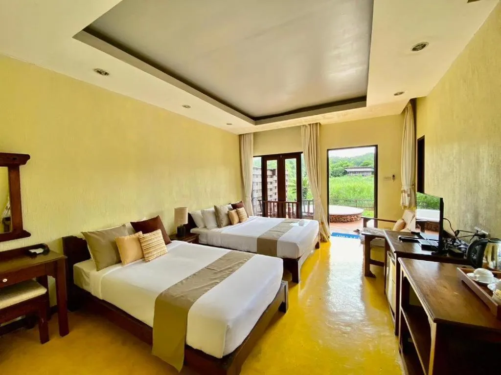 Bed in Pai Hotsprings Spa Resort