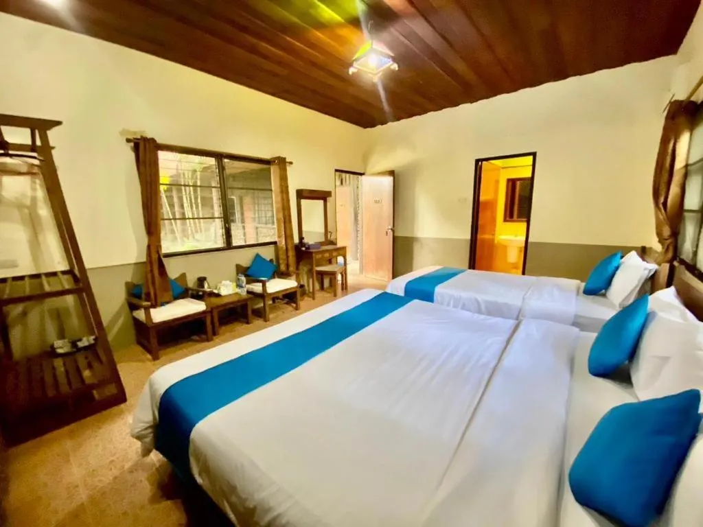 Bed in Pai Hotsprings Spa Resort