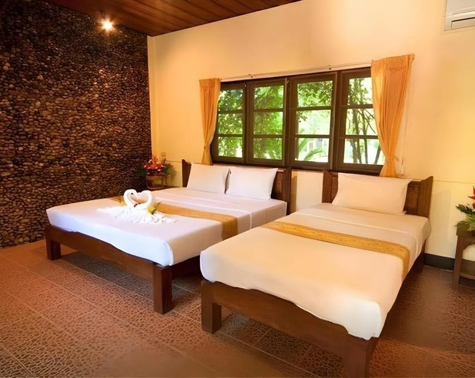 Bed in Pai Hotsprings Spa Resort