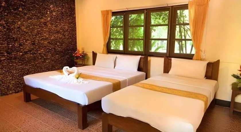 Bed in Pai Hotsprings Spa Resort