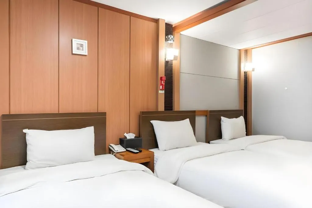 Bed in Hotel J Suwon