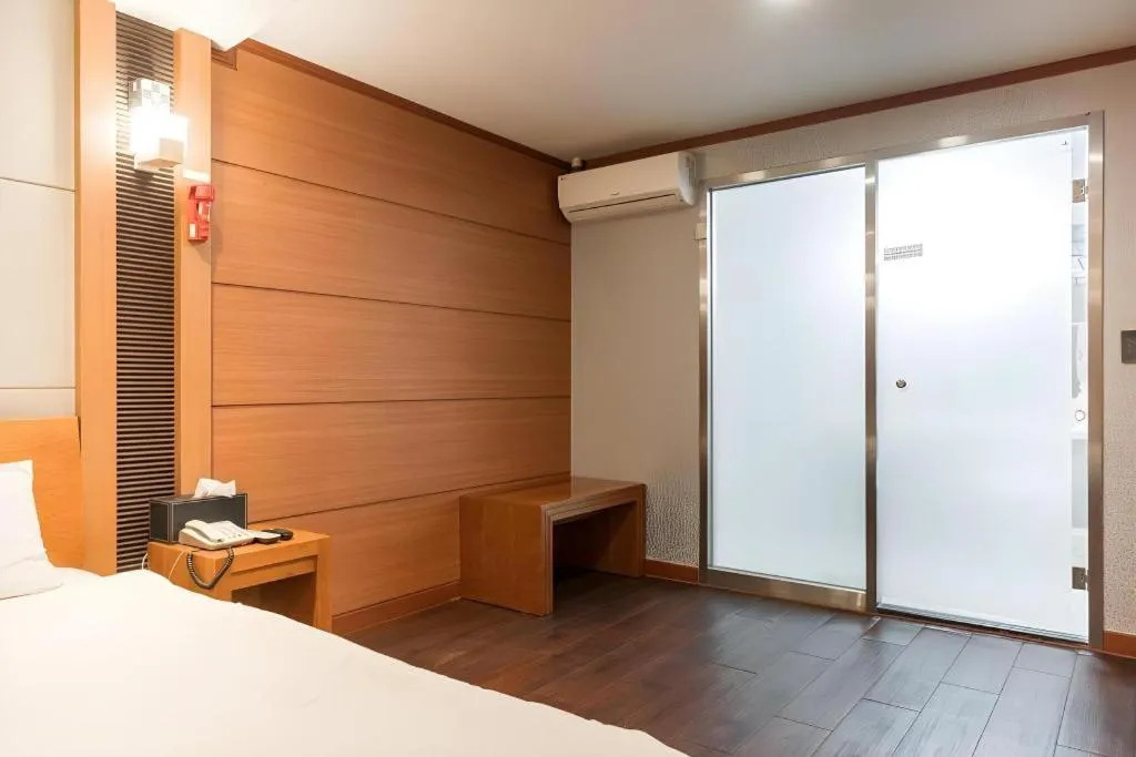 Bed in Hotel J Suwon