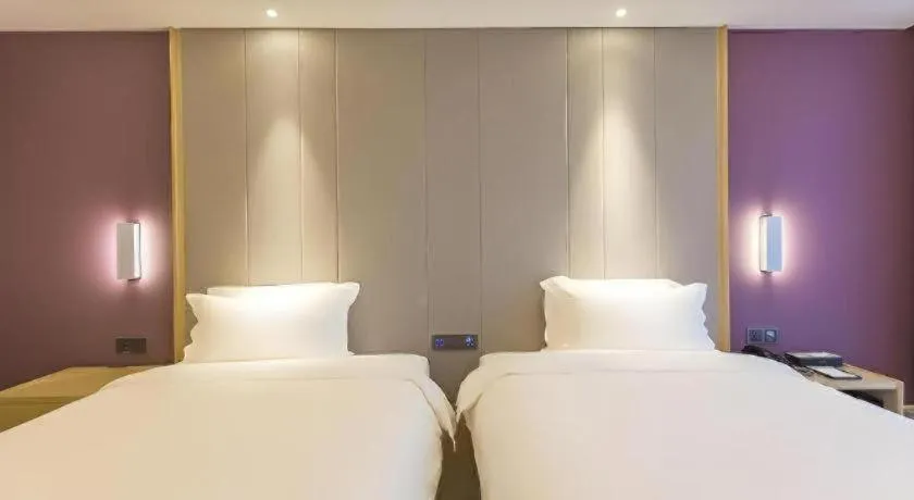 Bed in Lavande Hotels Guangzhou Zhihui City
