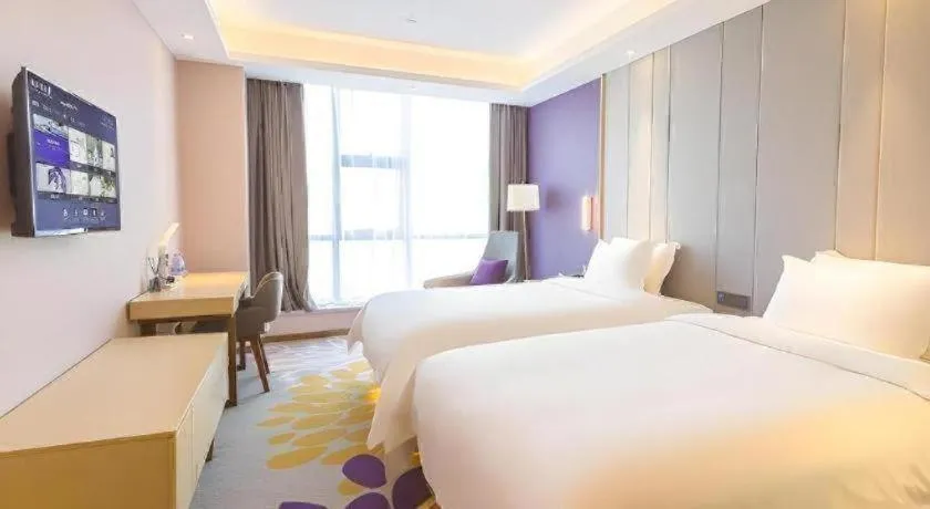 Bed in Lavande Hotels Guangzhou Zhihui City