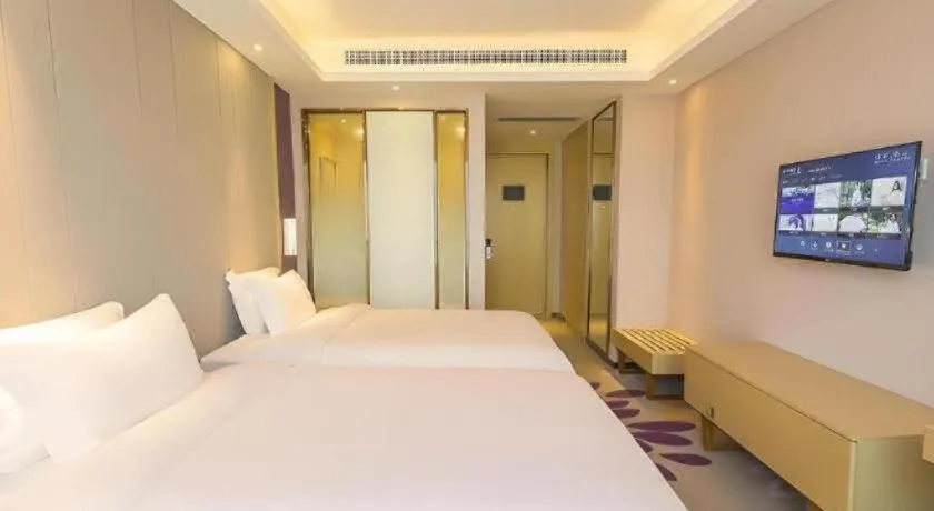 Bed in Lavande Hotels Guangzhou Zhihui City
