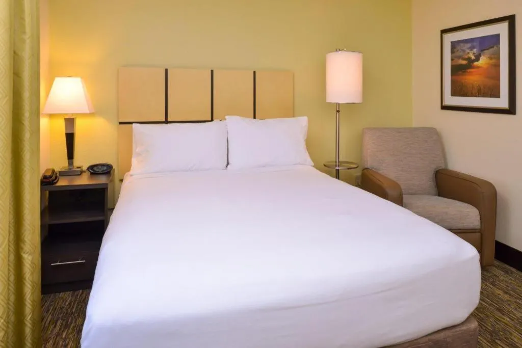 Bed in Candlewood Suites Bloomington-Normal By IHG