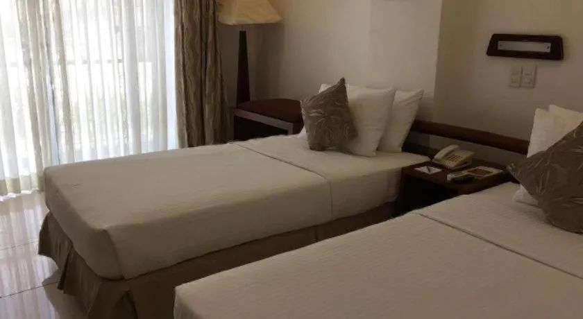 Bed in Soledad Suites