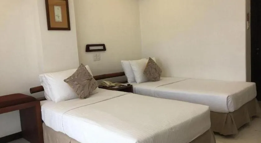 Bed in Soledad Suites