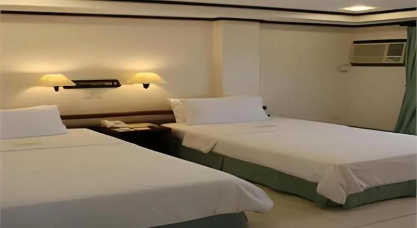 Bed in Soledad Suites