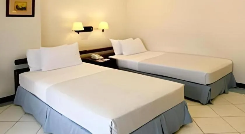 Bed in Soledad Suites