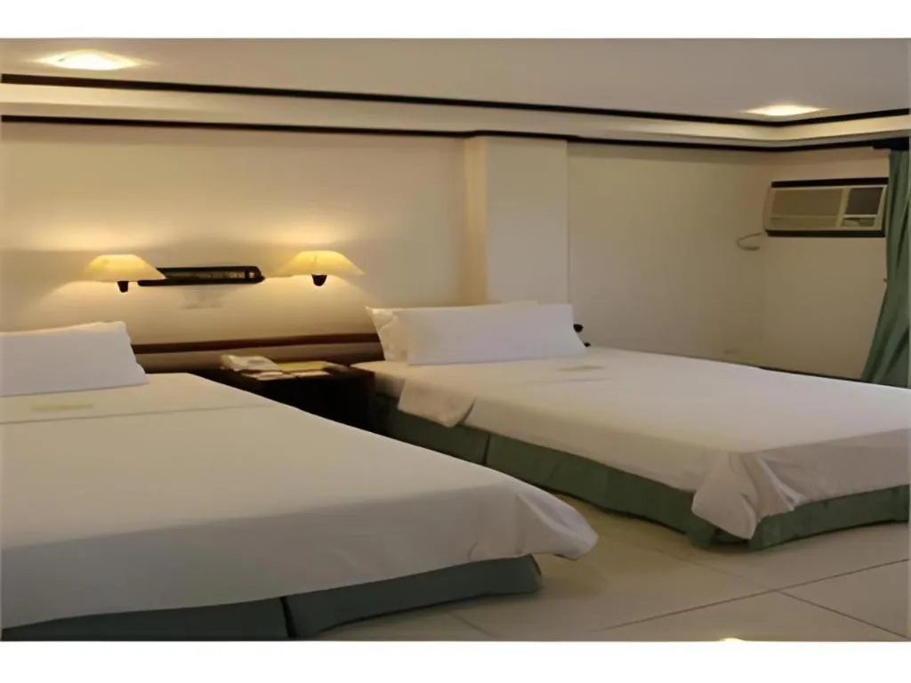 Bed in Soledad Suites