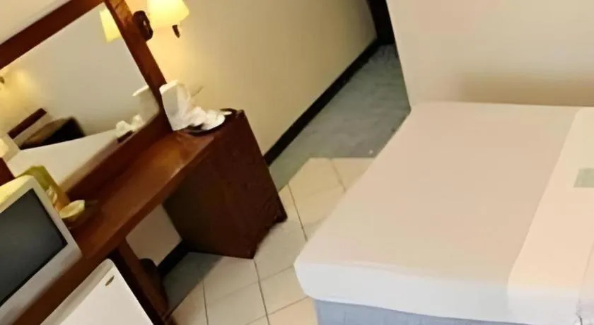 Bed in Soledad Suites