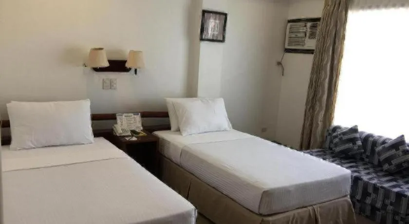 Bed in Soledad Suites