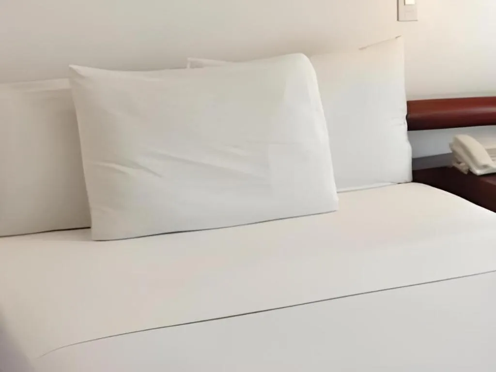 Bed in Soledad Suites