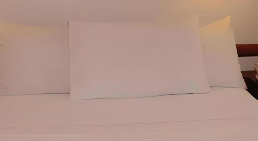 Bed in Soledad Suites