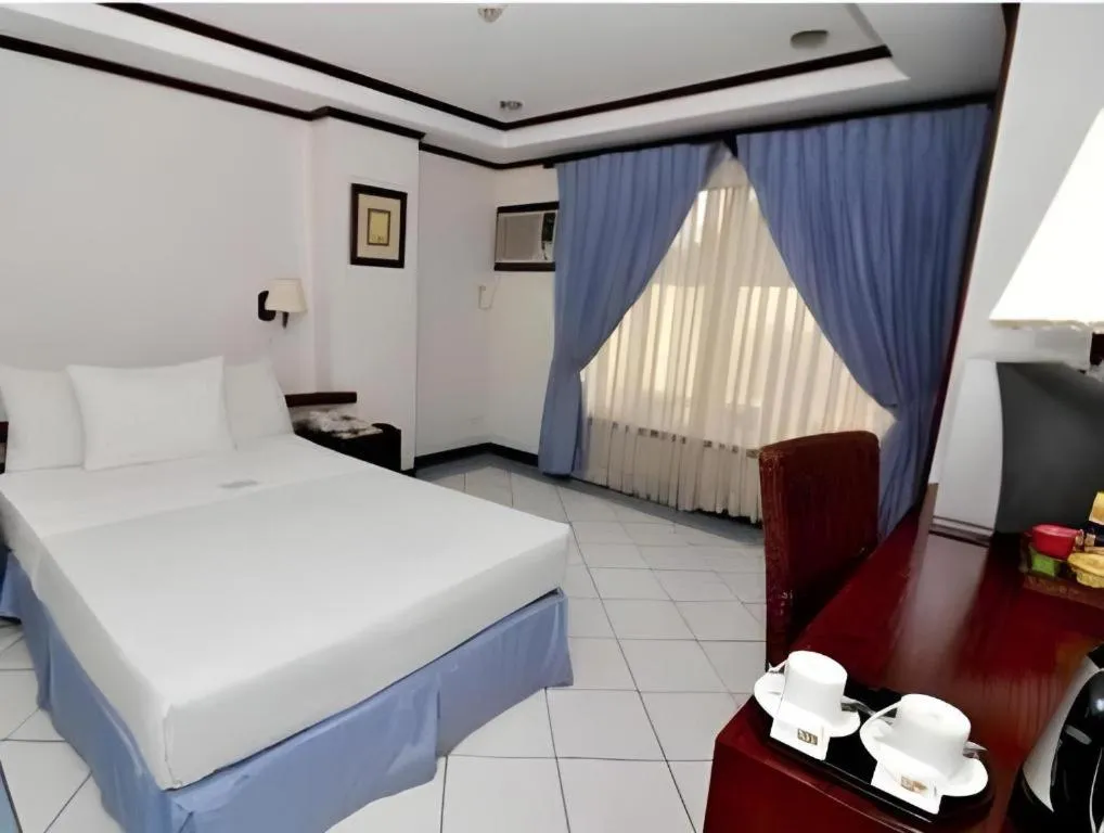 Bed in Soledad Suites