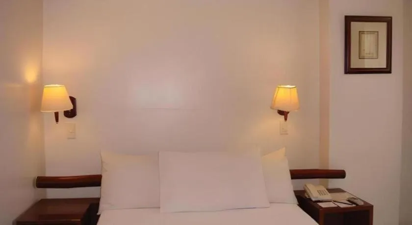 Bed in Soledad Suites