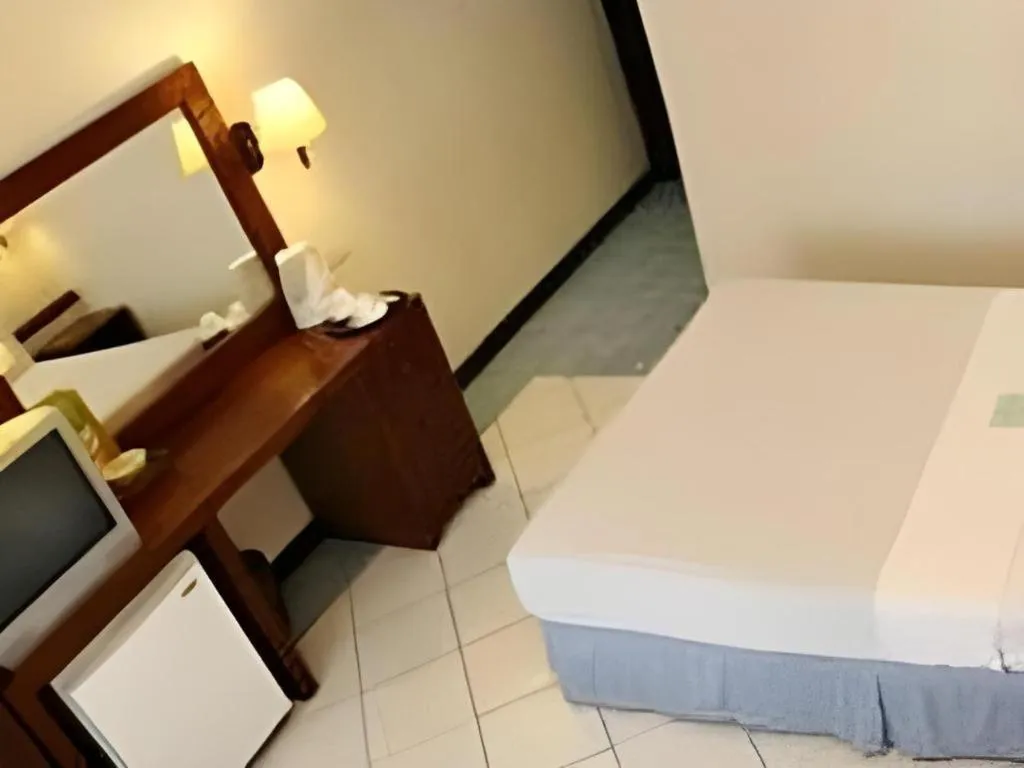 Bed in Soledad Suites