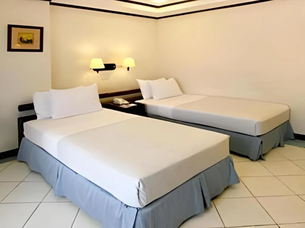 Bed in Soledad Suites