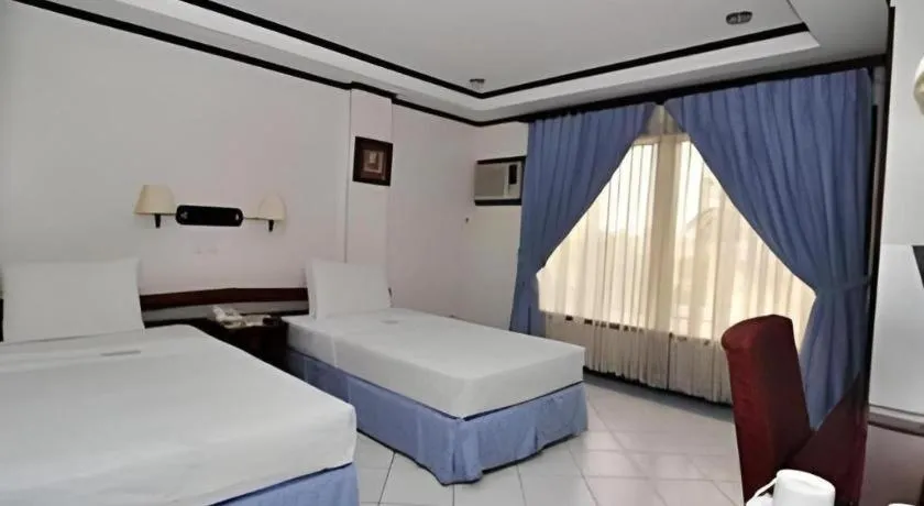 Bed in Soledad Suites