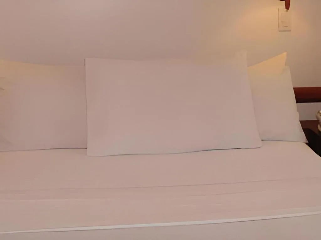 Bed in Soledad Suites