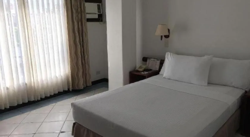 Bed in Soledad Suites